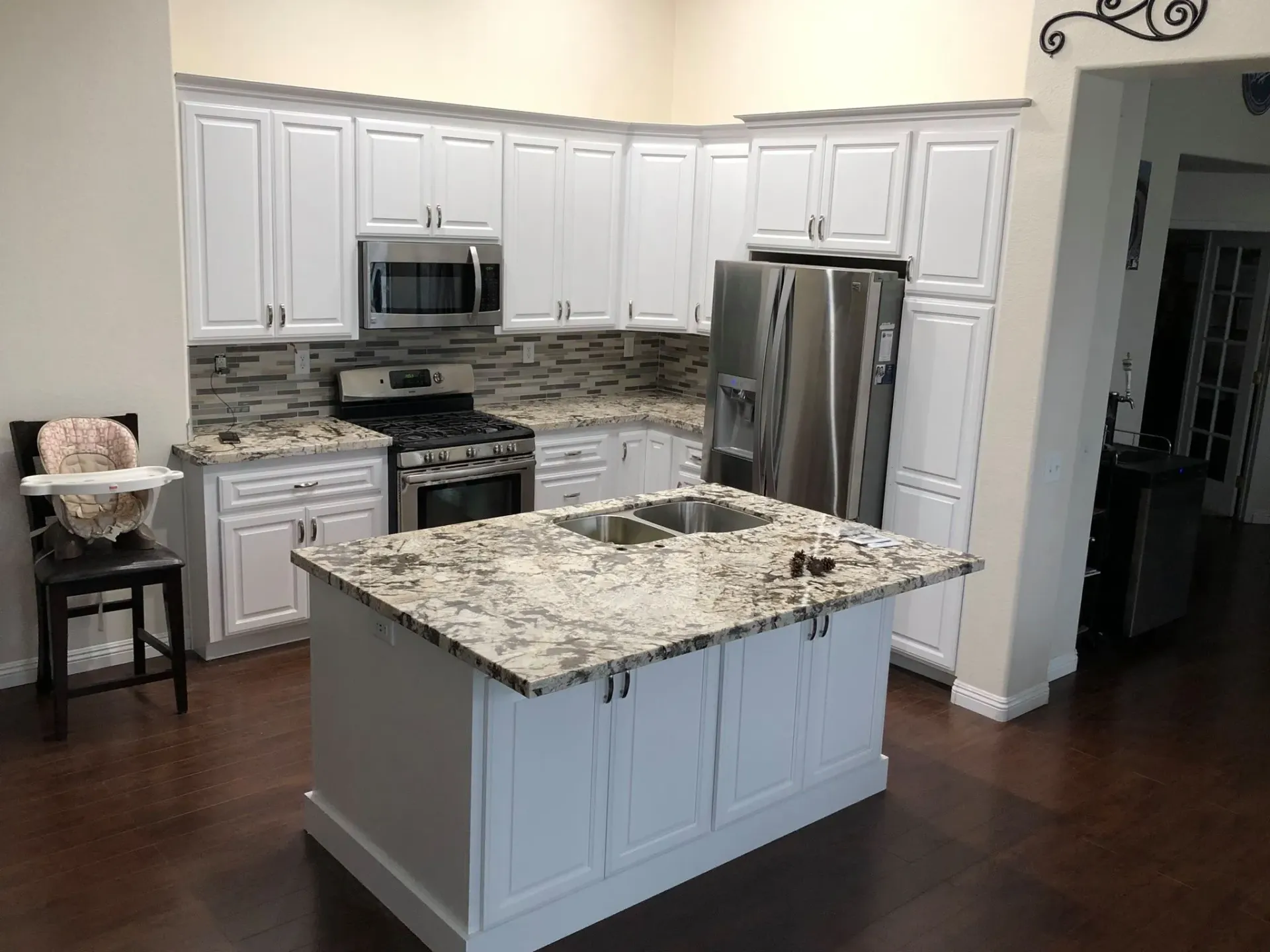 Bright island kitchen by G & L Cabinets